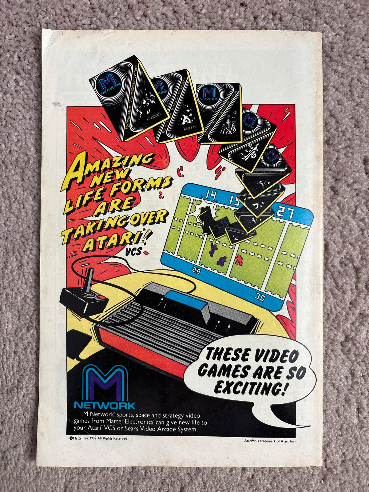 Back cover of Superman #382 featuring an M Network Atari video games advertisement