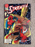 Front cover of DC Comics Starman #35, featuring Starman and a golden robot.